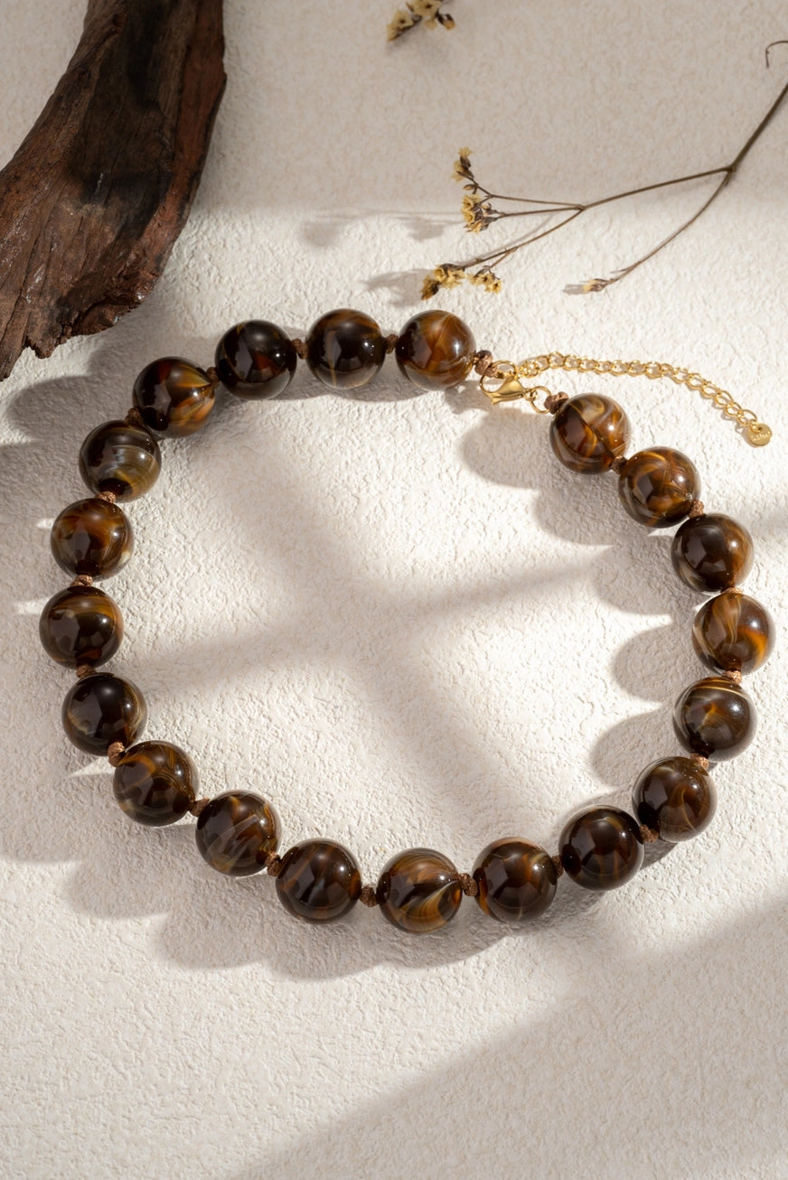 Collier perles marbrées